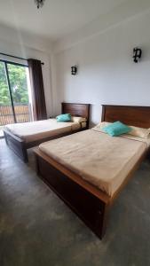 Postel nebo postele na pokoji v ubytování Shalom Bungalow
