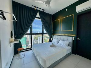 Postel nebo postele na pokoji v ubytování Cozy Urban Suites Georgetown View