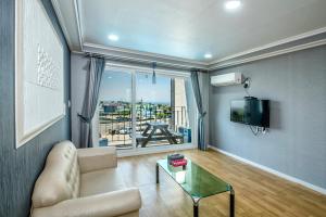 TV a/nebo společenská místnost v ubytování Mulddeule Shimpang Resort