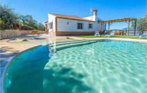 The swimming pool at or close to 3 Bedroom Amazing Home In El Gastor