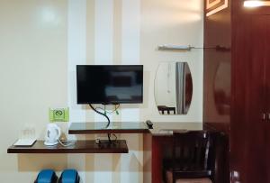 Kuchyň nebo kuchyňský kout v ubytování Hotel Juliana by RedDoorz + 16 fotografií