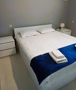 Postel nebo postele na pokoji v ubytování Gablile apartments
