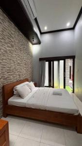 Ένα ή περισσότερα κρεβάτια σε δωμάτιο στο MOOvilla 1 Seminyak, Bali +20 φωτογραφίες