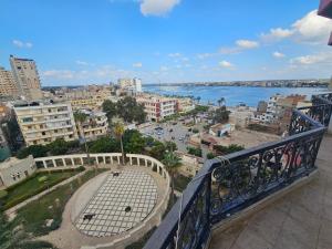 a view of a city from a balcony at Rasheed International Hotel - Families Only in Rashīd