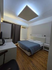 Posteľ alebo postele v izbe v ubytovaní Aegean Sea Rooms