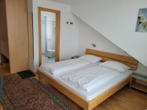 Postel nebo postele na pokoji v ubytování Gästezimmer Suppan