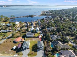 an aerial view of a town with houses and the water at Luxury Retreat near St. Andrews in Panama City Beach