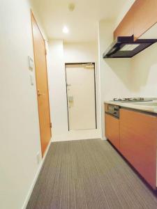 Kuchyň nebo kuchyňský kout v ubytování incense上野根岸201 + 8 fotografií