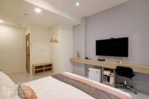 Sjónvarps- og/eða afþreyingartæki á Station Sea B&B
