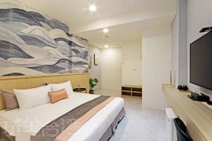 TV a/nebo společenská místnost v ubytování Station Sea B&B