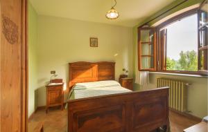 Ένα ή περισσότερα κρεβάτια σε δωμάτιο στο Awesome Apartment In Monforte D'alba