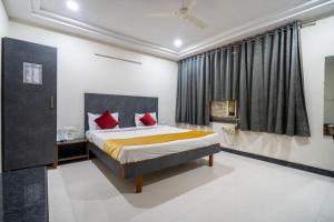 Ένα ή περισσότερα κρεβάτια σε δωμάτιο στο Hotel Ville Parle +22 φωτογραφίες