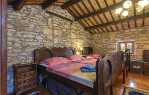 Postel nebo postele na pokoji v ubytování One-Bedroom Holiday Home In Labin