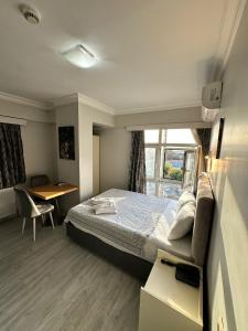 Postel nebo postele na pokoji v ubytování Bade Boutique Hotel Kadıköy + 37 fotografií