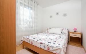 Posteľ alebo postele v izbe v ubytovaní Holiday Home Peroj Lxxiii