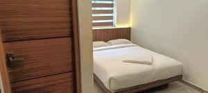 Postel nebo postele na pokoji v ubytování Green Tea Hotels