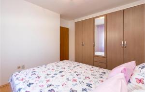 Posteľ alebo postele v izbe v ubytovaní Holiday Home Peroj Lxxiii