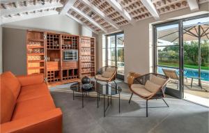 a living room with a couch and chairs and a table at Villa Casa Cupra in Umag