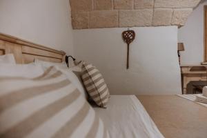 Postel nebo postele na pokoji v ubytování VinTage rooms