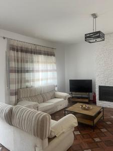 TV a/nebo společenská místnost v ubytování Casa rural Gómez de Hita