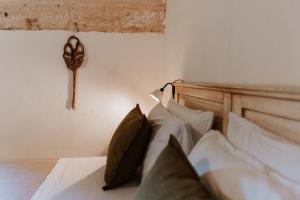 Postel nebo postele na pokoji v ubytování VinTage rooms