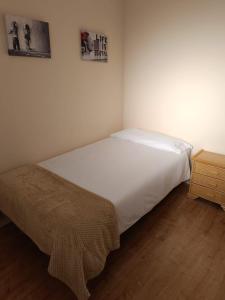 Ένα ή περισσότερα κρεβάτια σε δωμάτιο στο Apartamento Barbadillo - Redmansur +22 φωτογραφίες