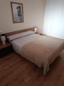 Ένα ή περισσότερα κρεβάτια σε δωμάτιο στο Apartamento Barbadillo - Redmansur