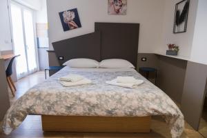 Postel nebo postele na pokoji v ubytování Avezzano 3e60
