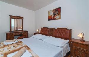 Posteľ alebo postele v izbe v ubytovaní Three-Bedroom Holiday Home In Podgrade