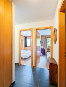 Giường trong phòng chung tại Apt Veysonnaz avec terrasse et vue imprenable