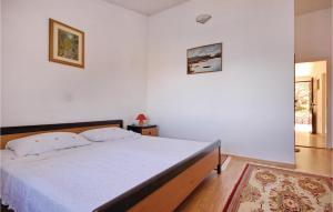 Łóżko lub łóżka w pokoju w obiekcie Apartment Crnja Luka Cr