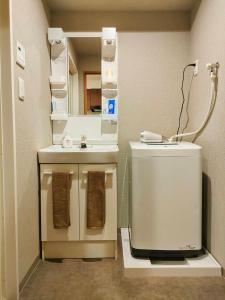 Η κουζίνα ή μικρή κουζίνα στο incense上野根岸601