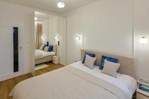 Ένα ή περισσότερα κρεβάτια σε δωμάτιο στο GOLD Apartment Uniejów