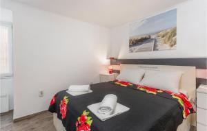 Posteľ alebo postele v izbe v ubytovaní 2 Bedroom Stunning Apartment In Rijeka