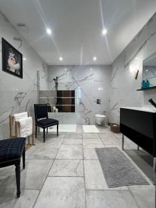 a bathroom with a sink and a toilet at Villa Pauline in Avignon
