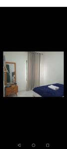 Ένα ή περισσότερα κρεβάτια σε δωμάτιο στο ZG Home Jogja