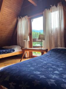 Postel nebo postele na pokoji v ubytování Dom w górach + 44 fotografií