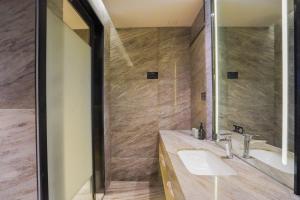 Phòng tắm tại Konggu Youlan Hotel Ningbo Yuyao North Xinjian Road