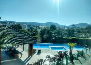 a view of a swimming pool from a house at Refúgio Campodoro in Florianópolis