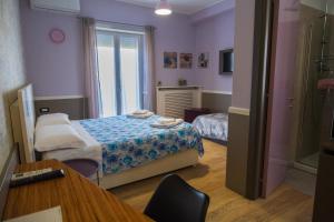 Postel nebo postele na pokoji v ubytování Avezzano 3e60