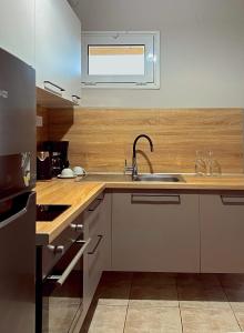 A kitchen or kitchenette at Panos Village
