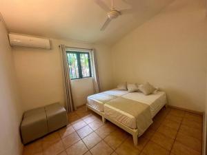 Postel nebo postele na pokoji v ubytování Villa Tamaris