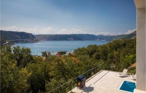a view of a lake from a house at Villa Adria Blue in Bakarac