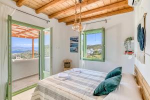 Voodi või voodid majutusasutuse Lefkes View Villa toas