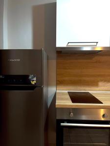 A kitchen or kitchenette at Panos Village Még 8 kép