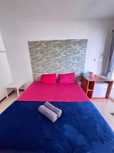 Postel nebo postele na pokoji v ubytování Koh Mook Sea View Bungalow