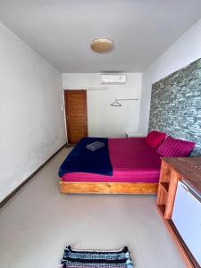 Postel nebo postele na pokoji v ubytování Koh Mook Sea View Bungalow
