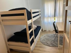 Ένα ή περισσότερα κρεβάτια σε δωμάτιο στο Sabina