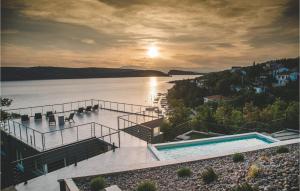 a house with a view of the water at Villa Grace in Jadranovo