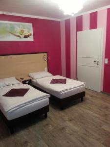 Krevet ili kreveti u jedinici u okviru objekta Pension Central Semmering